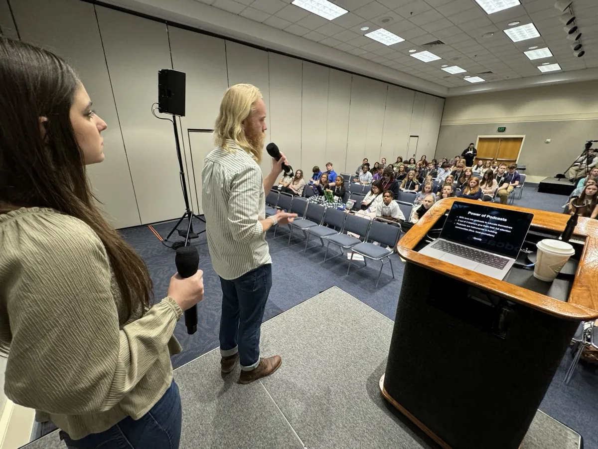 Speaking to a full auditorium at ARKAST