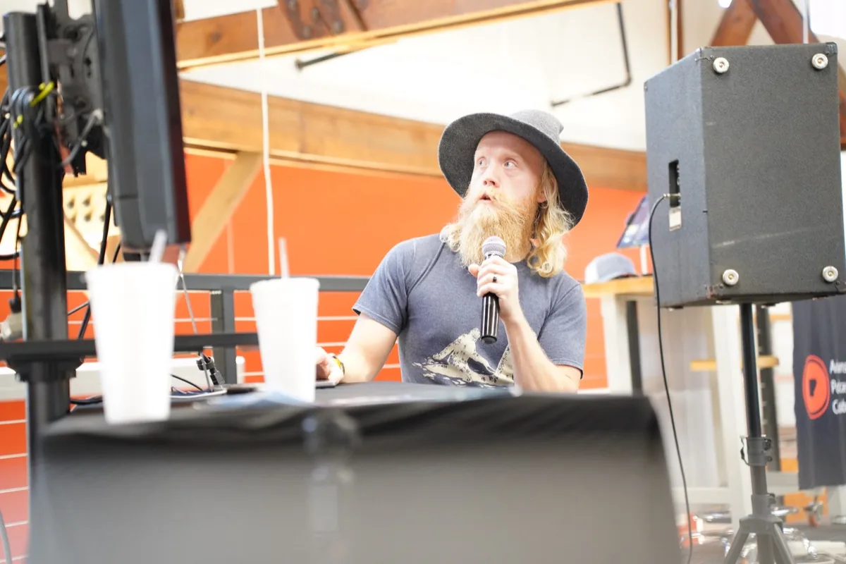 Editing podcast on a laptop