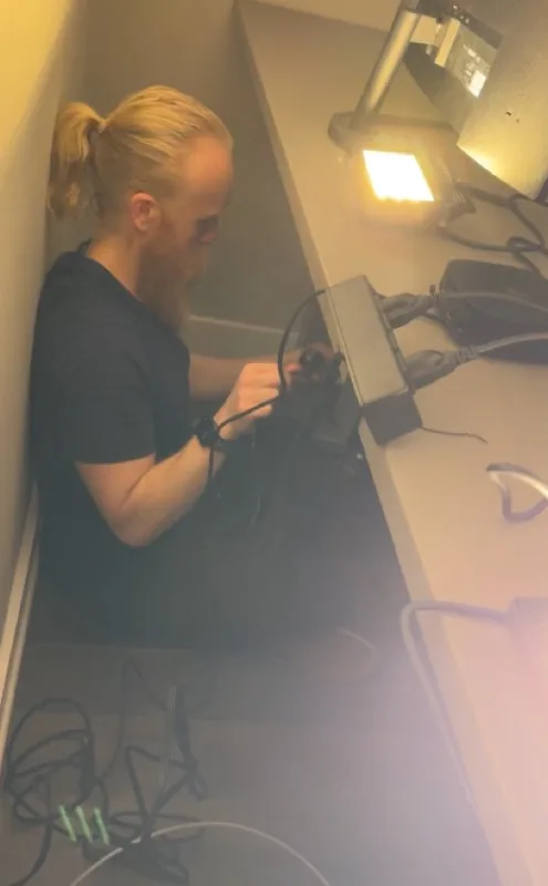 Working on podcast equipment