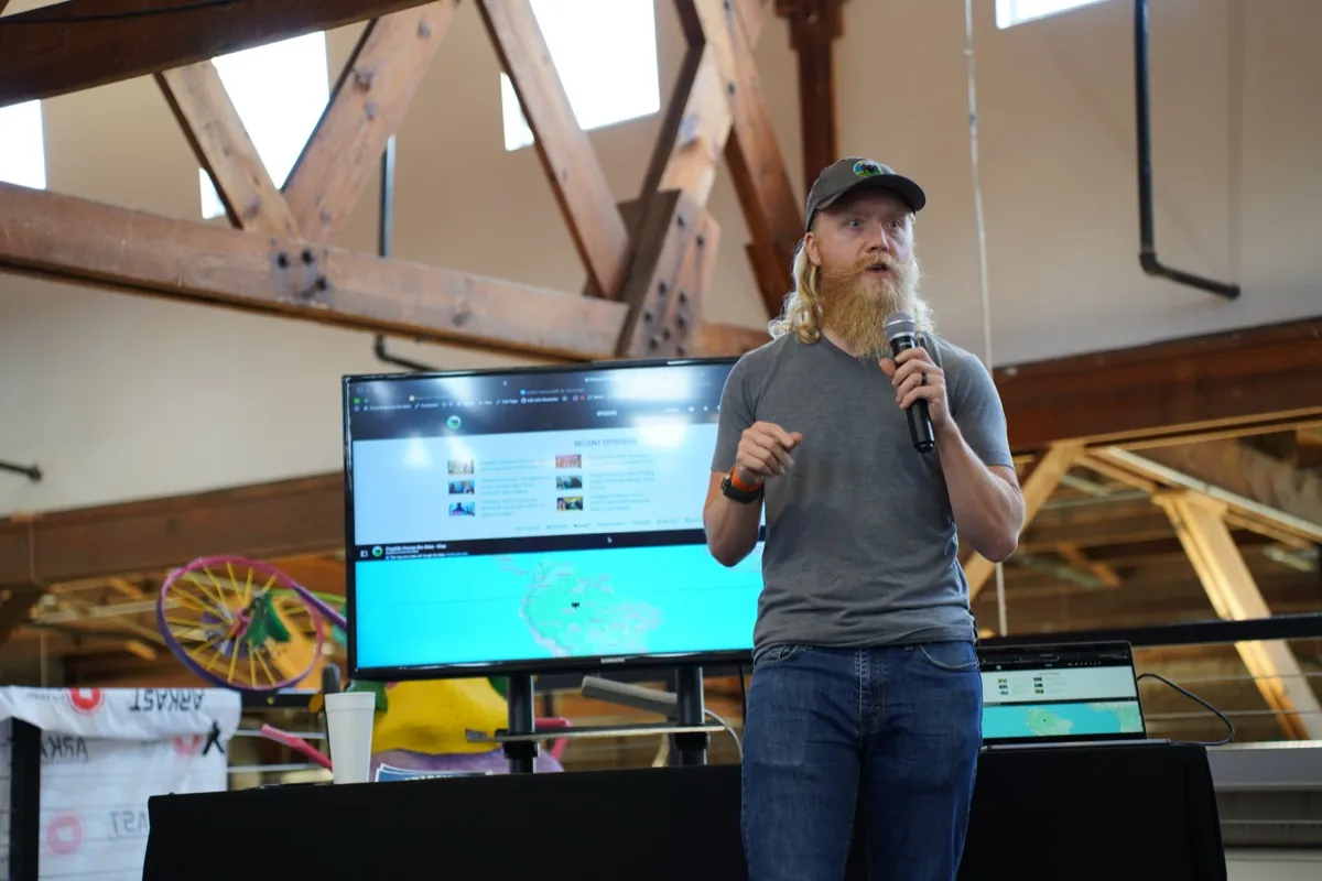 Cody teaching a session with marketing topics on screen