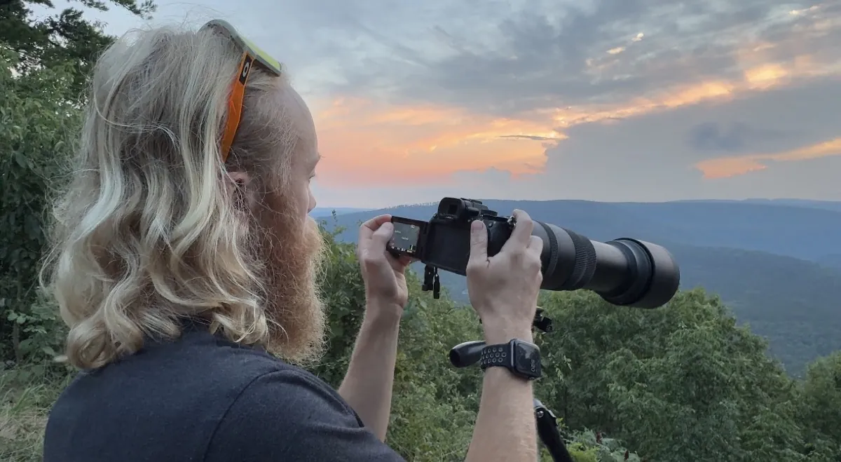 Cody shooting landscape video on location